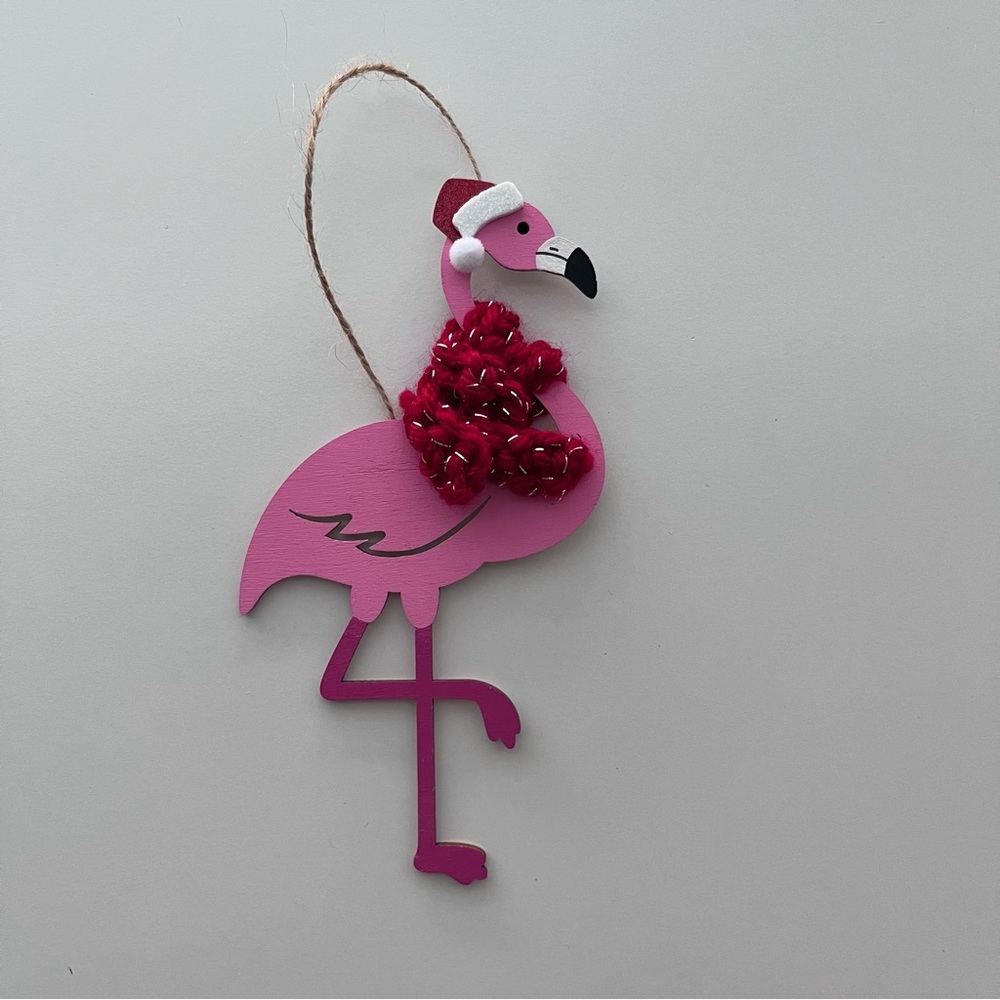 Hand painted wooden flamingo ornament with Santa hat and red scarf